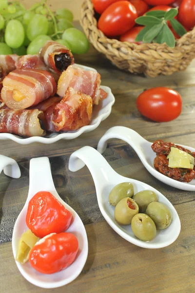 Stuffed Tapas with fruits and bacon — Stock Photo, Image