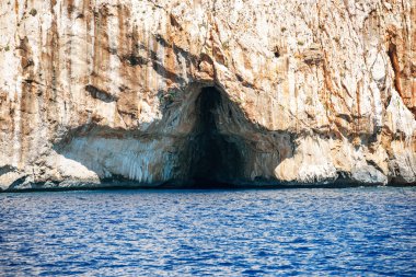 Big sea cave in the mediterranean coast clipart