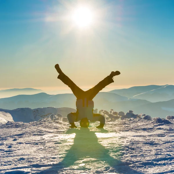 Young man having fun on snow — Stock Photo, Image