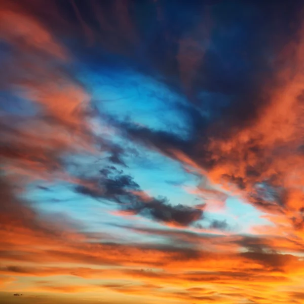 Colorful orange and blue dramatic sky — Stock Photo, Image