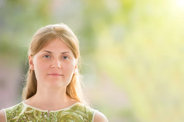 Pretty woman posing over a window — Stock Photo, Image