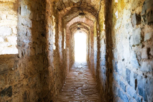 Dark corridor in dungeon — Stock Photo, Image