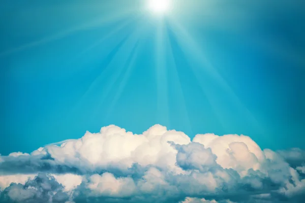 White clouds and bright sun — Stock Photo, Image