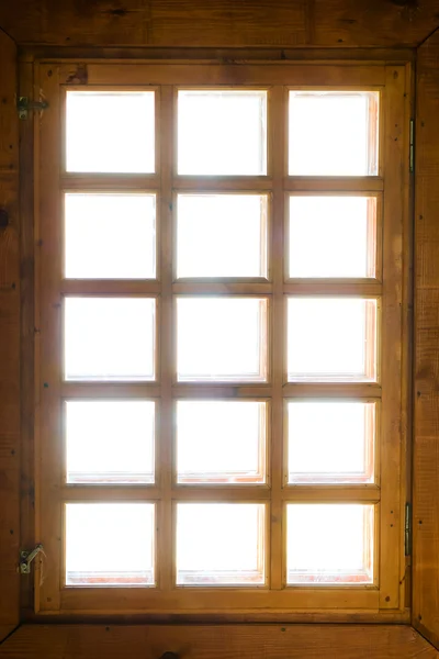 Wooden window with bars — Stock Photo, Image