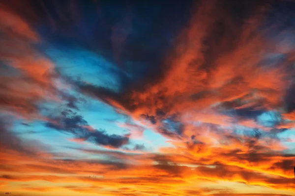 Colorful orange and blue dramatic sky — Stock Photo, Image