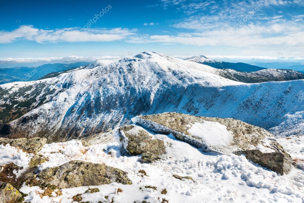 White peaks of mountains in snow