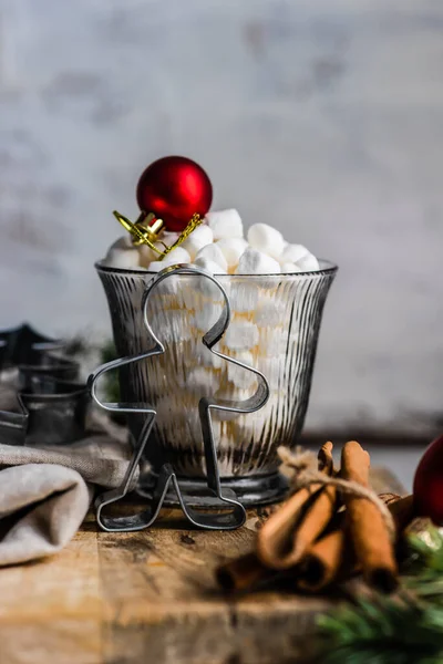 Christmas food card concept with glass full of marshmallow