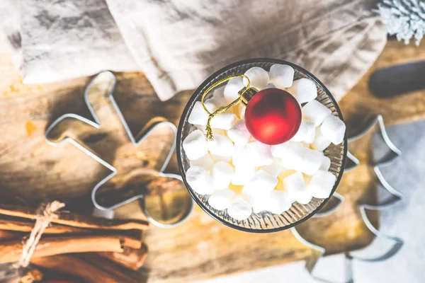 Christmas food card concept with glass full of marshmallow