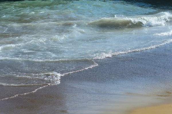 Zandstrand en zee — Stockfoto