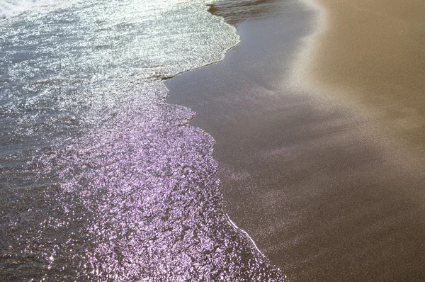 Zandstrand en zee — Stockfoto