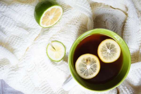 Tea with lemon an dscarf — Stock Photo, Image