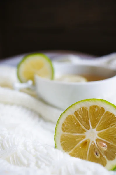 Tea with lemon an dscarf — Stock Photo, Image