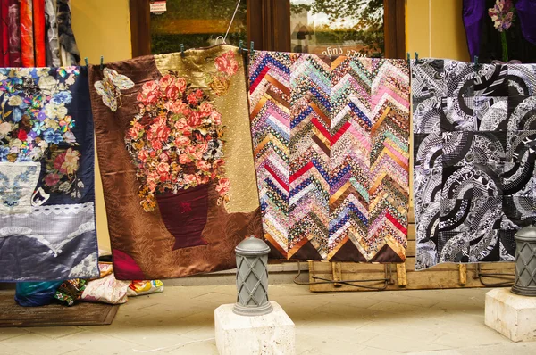 Old carpets in the street market — Stock Photo, Image