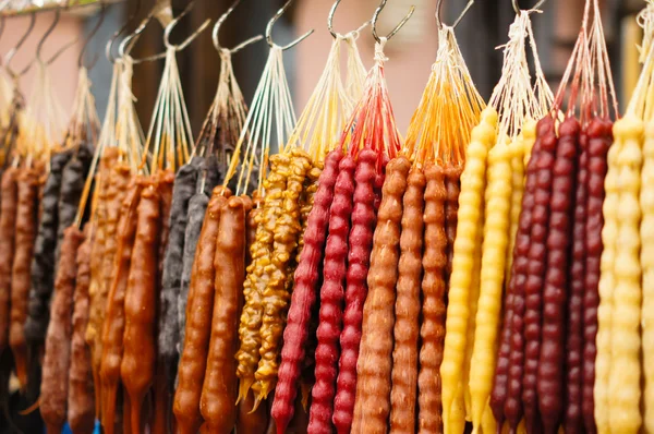 Doces tradicionais em forma de salsicha georgiana Imagens De Bancos De Imagens Sem Royalties