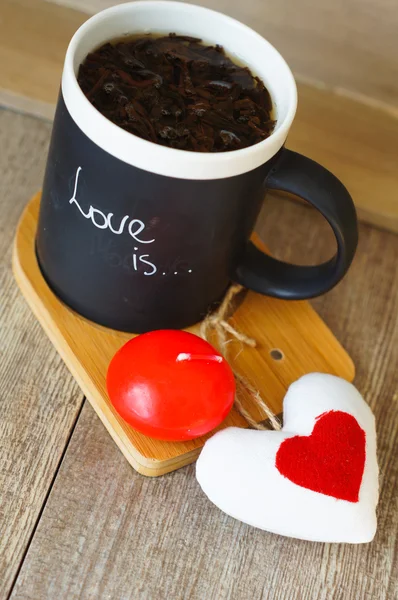 Love is note on the mug — Stock Photo, Image