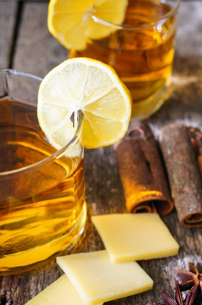 Glass of brandy with lemon — Stock Photo, Image