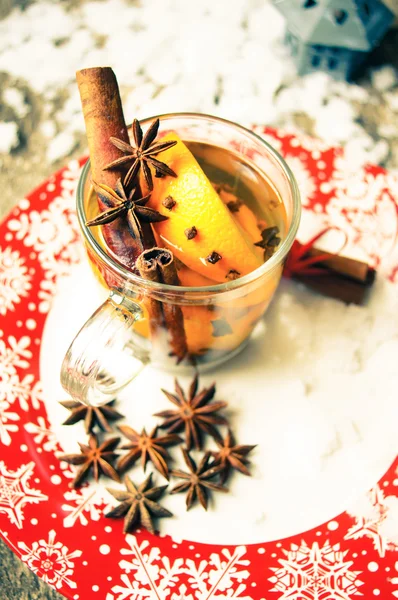 Winter time: hot wine with spices — Stock Photo, Image