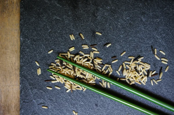 Chopsticks and rice — Stock Photo, Image