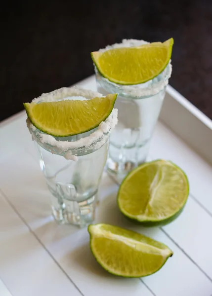 Tequila shot with lime — Stock Photo, Image