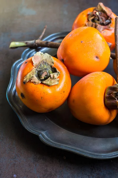 Ripe persimmons fruits — Stock Photo, Image