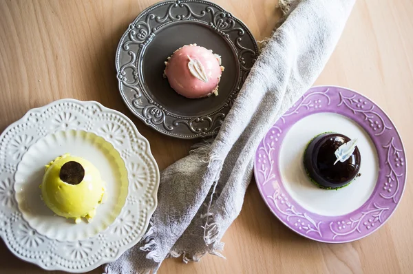 European sweets on the rustic plate — Stock Photo, Image