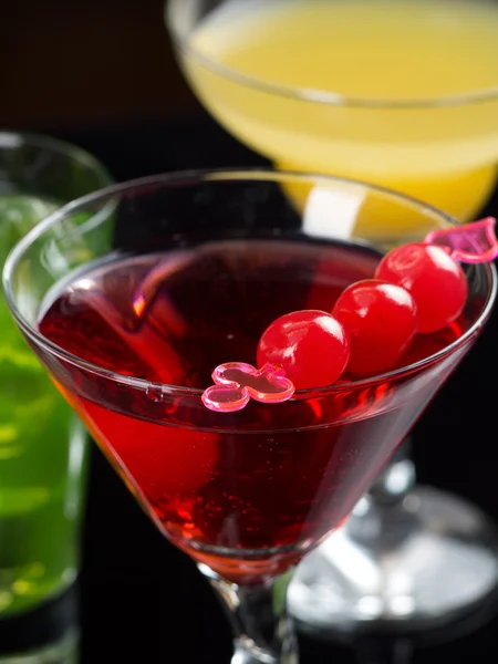 Various cocktails on black background — Stock Photo, Image