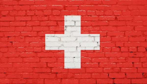 Bandera de Suiza, bandera suiza pintada sobre pared de ladrillo —  Fotos de Stock