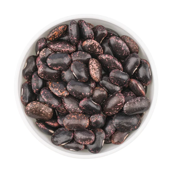 Dried beans in bowl on white background — Stock Photo, Image