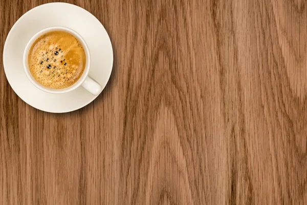 Café taza clásica en una mesa de madera vista superior —  Fotos de Stock