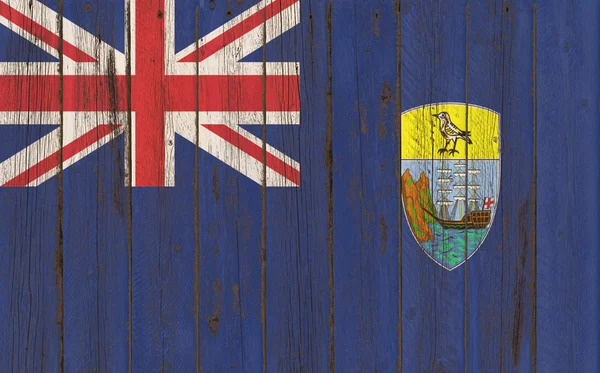 Flag of Saint Helena painted on grungy wood plank background — Stock Photo, Image