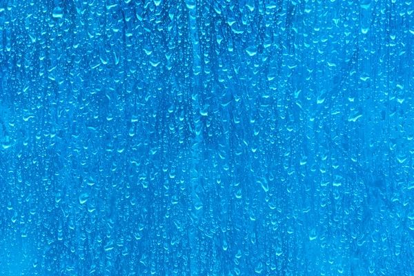 Natürliche blaue Wassertropfen Hintergrund — Stockfoto