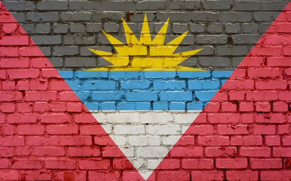 Flag of Antigua Barbuda painted on brick wall, background textur — Stock Photo, Image
