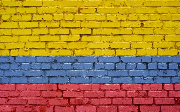 Флаг Колумбии, раскрашенный на кирпичной стене, текстура фона — стоковое фото