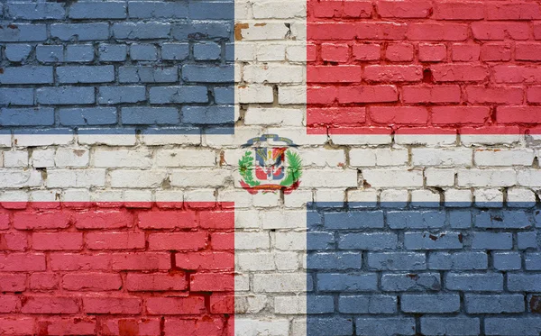 Dominikai Köztársaság zászlaja festett téglafal, háttér — Stock Fotó