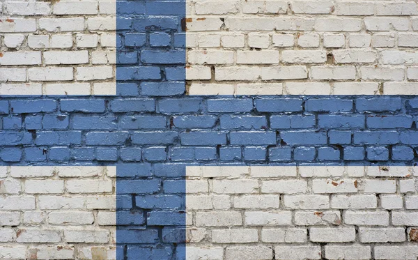 Bandera de Finlandia pintada sobre pared de ladrillo, textura de fondo — Foto de Stock