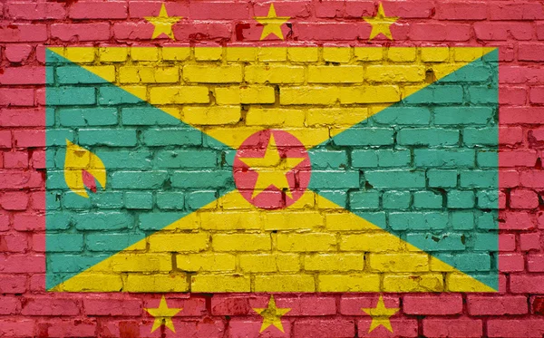 Vlag van Grenada geschilderd op de muur, achtergrondstructuur — Stockfoto