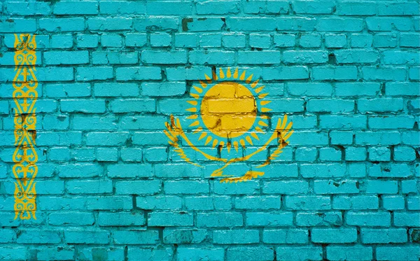 Flaga Kazachstanu malowane na mur z cegły, tekstury tło — Zdjęcie stockowe