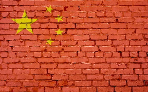 Флаг Китая, окрашенный на кирпичной стене, текстура фона — стоковое фото