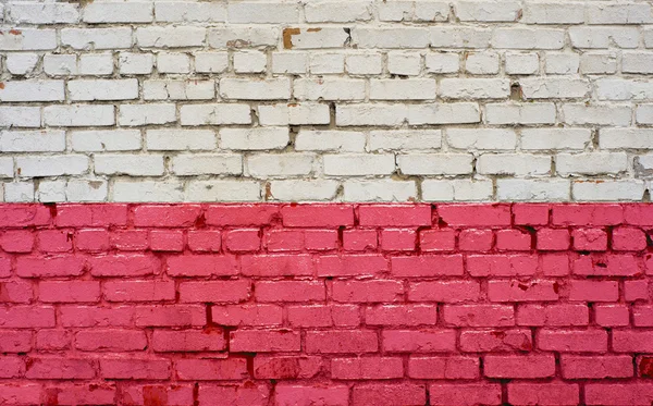 Polonya bayrağı arka plan doku tuğla duvara boyalı — Stok fotoğraf