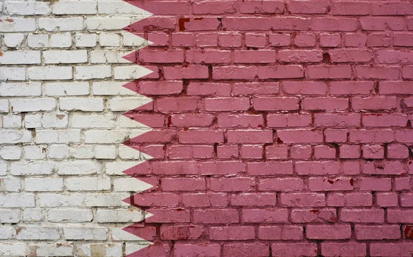 Flag of Qatar painted on brick wall, background texture — Stock Photo, Image