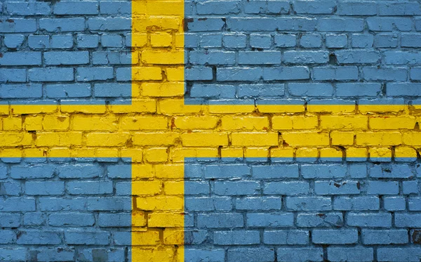 Bandera de Suecia pintada sobre pared de ladrillo, textura de fondo —  Fotos de Stock