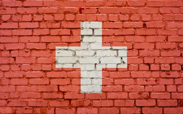 Bandera de Suiza pintada sobre pared de ladrillo, textura de fondo —  Fotos de Stock