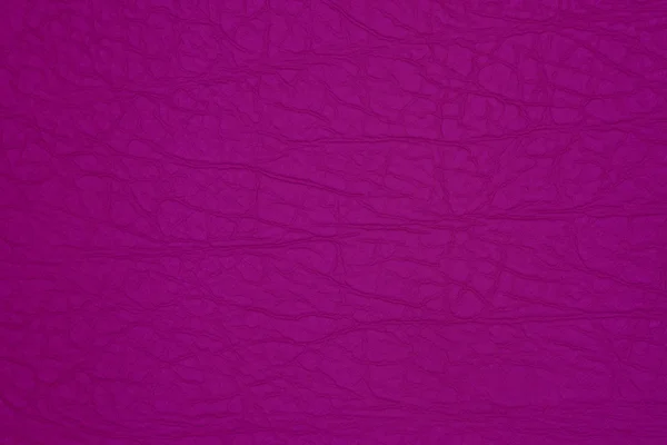 Фиолетовый кожаный фон — стоковое фото