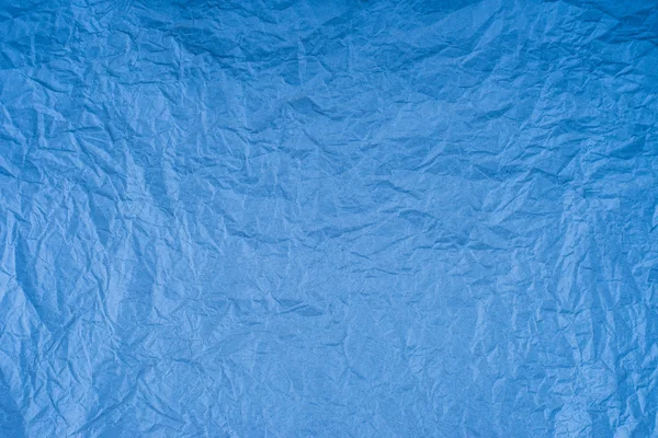 Фон из голубой пустой морщинистой бумаги. Текстура обратной стороны с c — стоковое фото