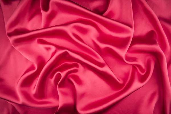 Roter Satin oder Seidenstoff als Hintergrund — Stockfoto