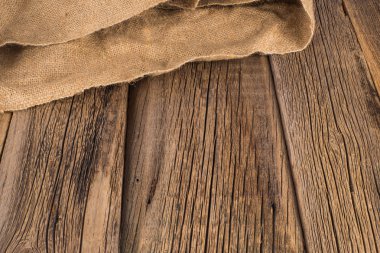 ahşap masa arka plan üzerine çuval bezi doku