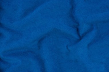 Mavi buruşuk kumaş dokusu. Yakın çekim yumuşak pamuklu kumaş, olabilir