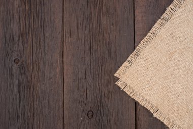 Eski çuval bezi ve ahşap doku. 