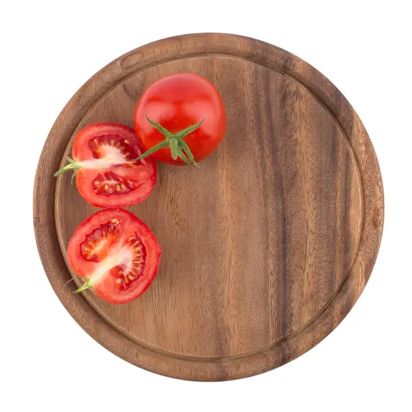Posiekane pomidory na deska do krojenia. — Zdjęcie stockowe