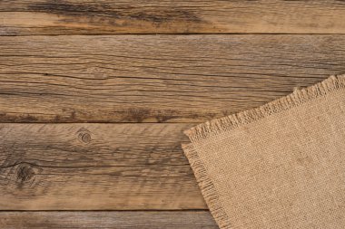 Eski çuval bezi ve ahşap doku. 